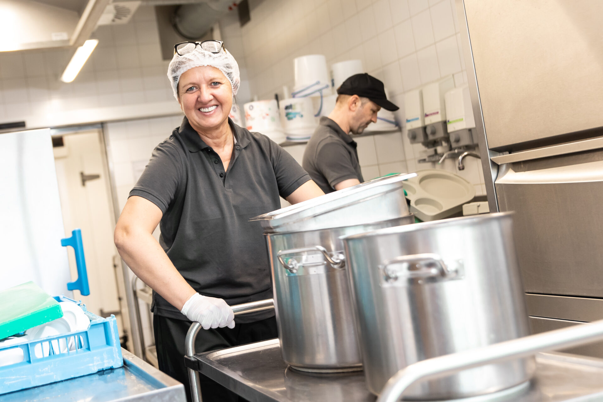 Mitarbeiterin in der Küche Mitarbeiterin in der Küche